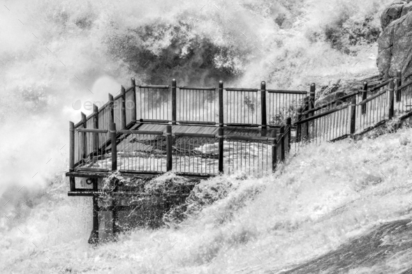 Flooded viewpoint at main Augrabies fall. Monochrome Stock Photo by dpreezg