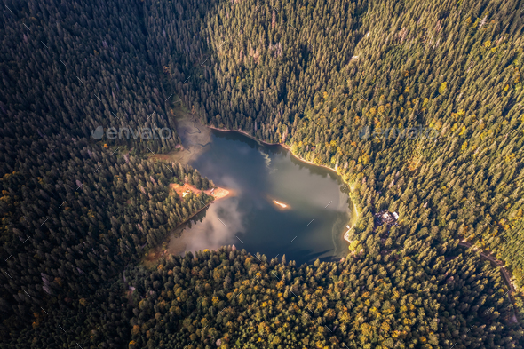 Aerial view of wild lake in summer mountains - Stock Photo - Images
