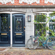 House entrance with two doors and bicycle in Amsterdam - PhotoDune Item for Sale