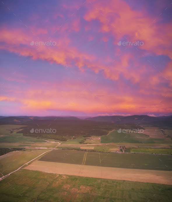 Scenic aerial view of beautiful purple sunset. - Stock Photo - Images