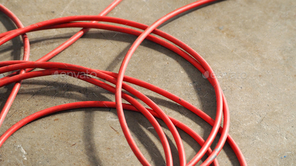 Red color electric power wire cable.