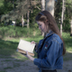 Portrait of a beautiful girl with a book. - PhotoDune Item for Sale