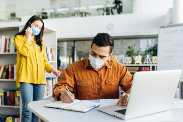 woman man work quarantine pandemic medical mask colleagues student online
