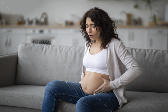 Braxton Hicks Contractions. Young Pregnant Woman Having Abdominal Pain ...