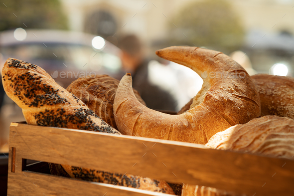 Various fresh french pastries and bread in a box - Stock Photo - Images
