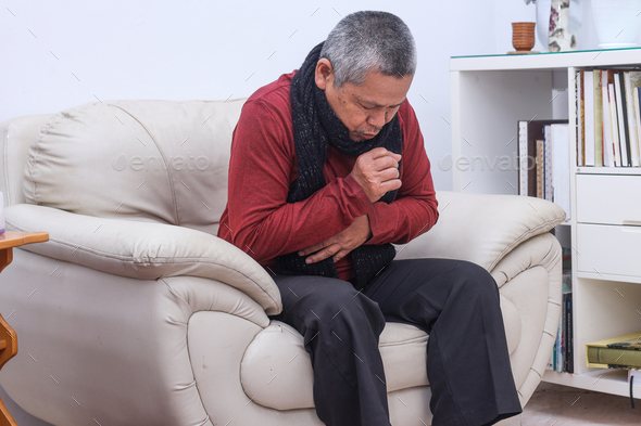 Old man get a cold and cough at home