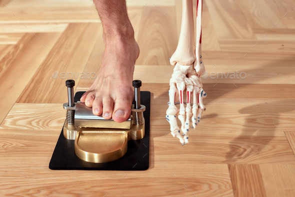 Diagnosis of flat feet human leg and medical skeleton and orthopedic equipment pilates, problems