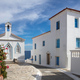 Andros island, Chora town, Cyclades Greece. Agia Varvara white orthodox church, sea sky sunny day. - PhotoDune Item for Sale