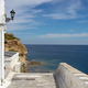 Andros island, Chora town, Cyclades destination Greece. Aegean sea blue sky sunny day, paved alley. - PhotoDune Item for Sale