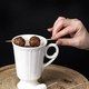 A woman&#39;s hand stirs hot chocolate with chocolates skewer - PhotoDune Item for Sale