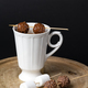 Cup of hot chocolate drink with marshmallows and chocolates skewers - PhotoDune Item for Sale