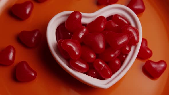 Rotating stock footage shot of Valentines decorations and candies - VALENTINES 0079 alt