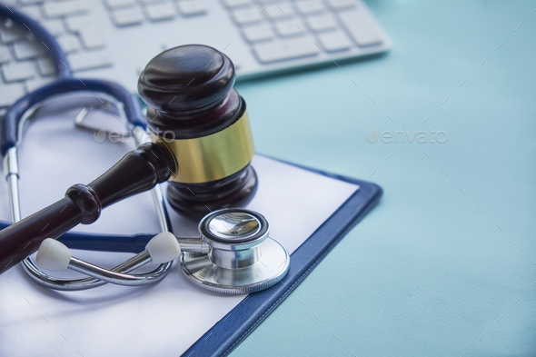 Gavel and stethoscope. medical jurisprudence. legal definition of medical malpractice. attorney