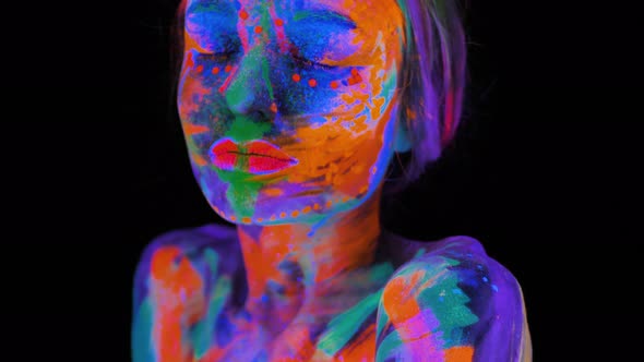 Beautiful Young Woman in Neon Light