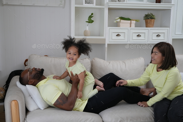 Multi ethnic family and their domestic life in daytime Stock Photo by ...