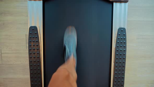 Runner Treadmill Workout.Treadmill Fitness Running.Man Legs Running On Treadmill In Home.Private Gym alt