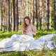 Young woman wakes up in a summer forest - PhotoDune Item for Sale