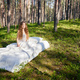 Woman sleeps on a mattress in the summer forest - PhotoDune Item for Sale