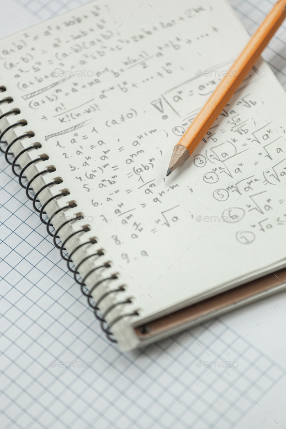 Math formulas are written in pencil on a piece of paper, math pr