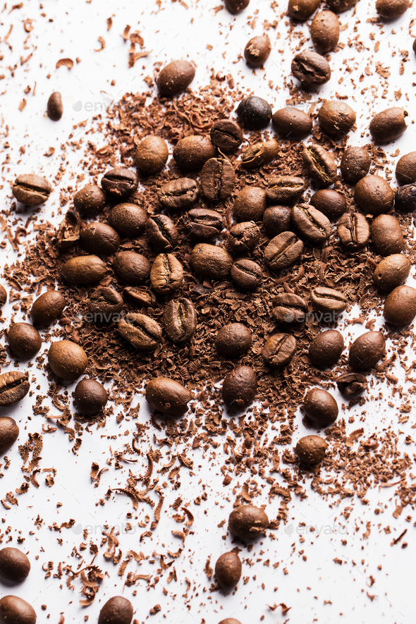 Coffee beans and particles of black chocolate Stock Photo by BLACKDAY