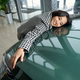 Happy young asian woman hugging the hood of new car - PhotoDune Item for Sale