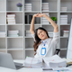 Asian businesswoman enjoy and happy of relaxing at the office. - PhotoDune Item for Sale