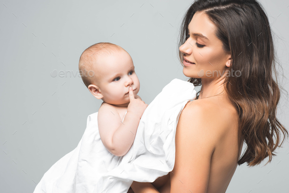 Portrait Of Attractive Smiling Naked Mother Hugging Baby Babe Isolated