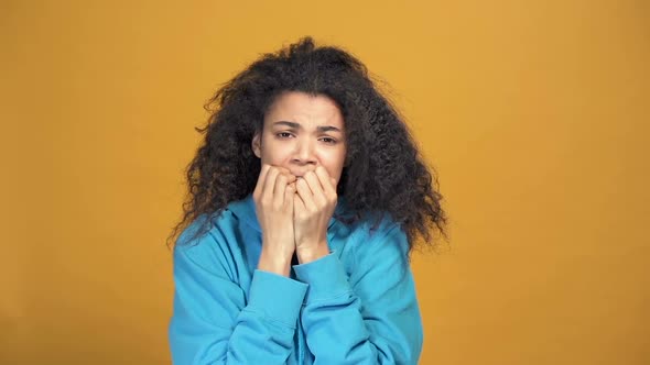 Portrait of stressed afro american woman.