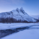Frozen river and mountain. A classic view in Norway during winter. Otertind mountain, Norway. - PhotoDune Item for Sale