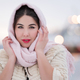 Winter portrait of happy brunette young woman on winter evening outdoors. Soft lighting on evening - PhotoDune Item for Sale