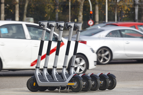 Electric scooters in the city. Urban mobility, sustainable lifestyle