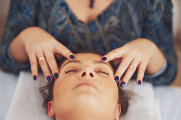 Picture of an treatment that involves gently touching 32 points on your head - Stock Photo - Images