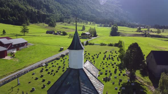 Loen church at sunrise - Morning reverse aerial from church tower and back - Revealing countryside f alt