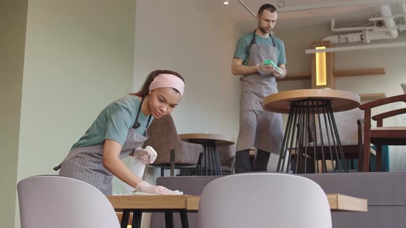 People Working in Cafe alt