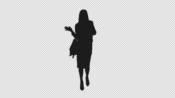 Silhouette of Young Woman Walking with Handbag and Gesturing Hand while Talking on Phone