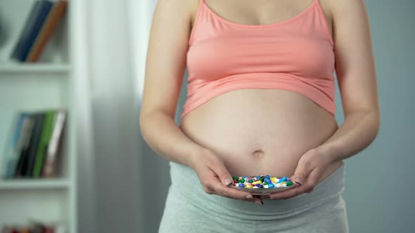 Woman Rejecting Pills and Additives for Healthy Pregnancy, Conscious Parenthood alt
