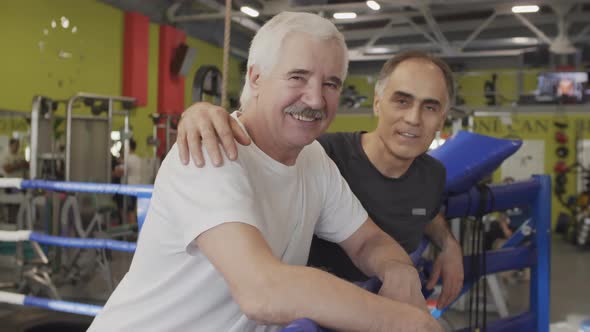 Two Seniors in Boxing Center alt