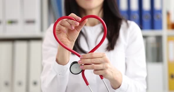 Doctor Makes Heart Emblem Out of Stethoscope alt