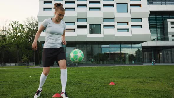 Portrait of Woman Football Soccer Player in Full Growth in the Park