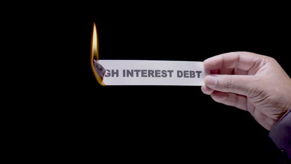 Paper Burning High Interest Debt
