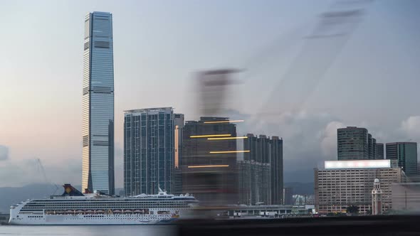 Hong Kong China Skyline Panorama with Skyscrapers From Across Victoria Harbor Evening Timelapse alt
