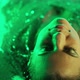 Sensual Woman Posing Seductively in Swimming Pool Water Under Neon Color Light - VideoHive Item for Sale