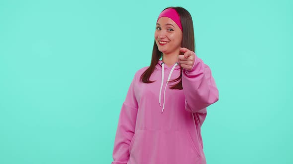 Girl Smiling Excitedly Pointing to Camera Beauty Choosing Lucky Winner Indicating to Awesome you alt