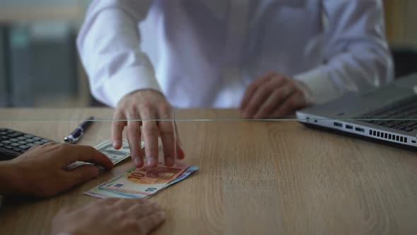 Bank Client Exchanging Dollars for Euro, Money Changer Service, Foreign Currency alt