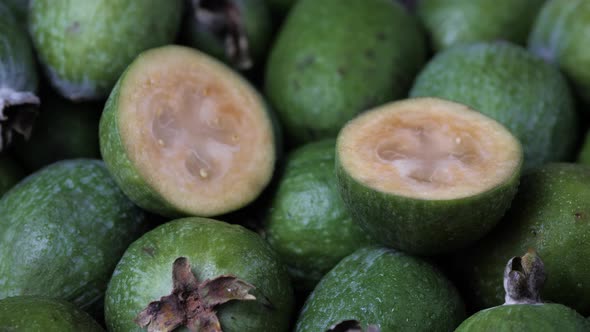 Fresh ripe sweet feijoa fruits. Healthy food background.