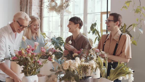 Joyous Women and Men Chatting and Laughing on Floristics Masterclass alt