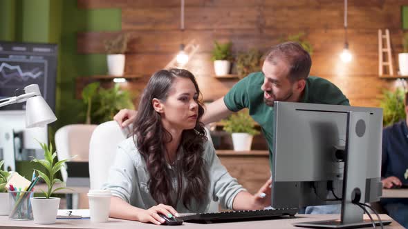 Manager Talking with a Worker About a New Project alt