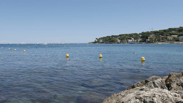 Yellow marker  swim area buoys on water 4K 2160p 30fps UltraHD footage - Swimming zone border signs 