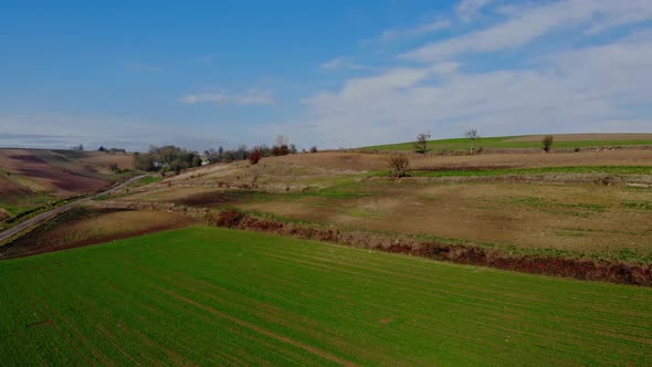 A flight over cultivated fields. alt