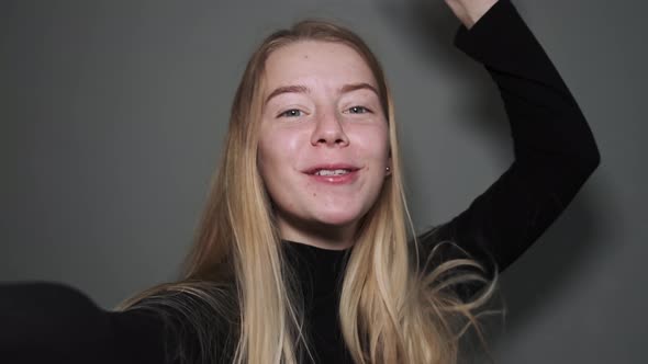 The Girl Communicates Via Video Link with Her Loved Ones alt